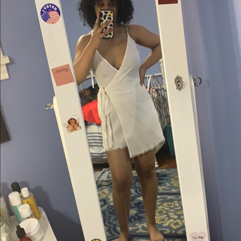 White wrap around Low cut dress